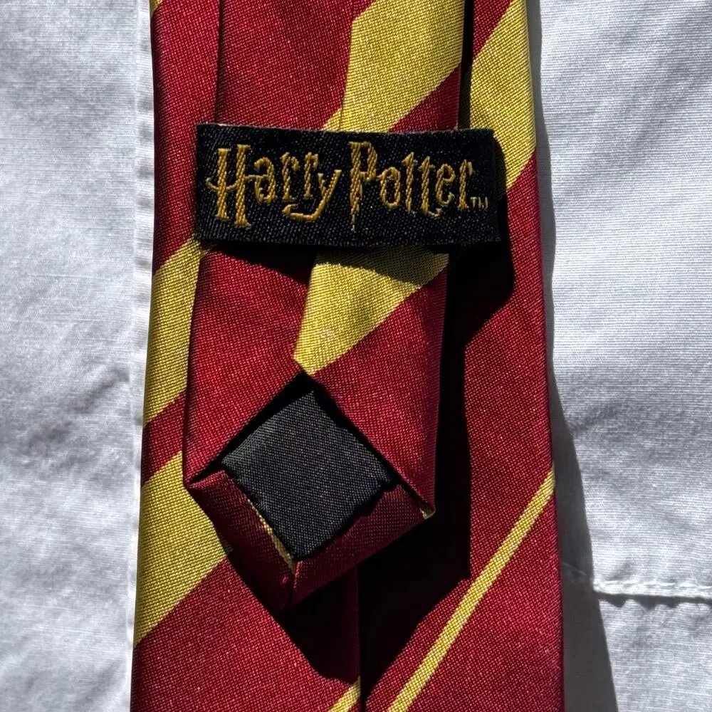 Harry Potter Gryffindor Necktie Burgundy Gold Striped House Crest Warner Bros